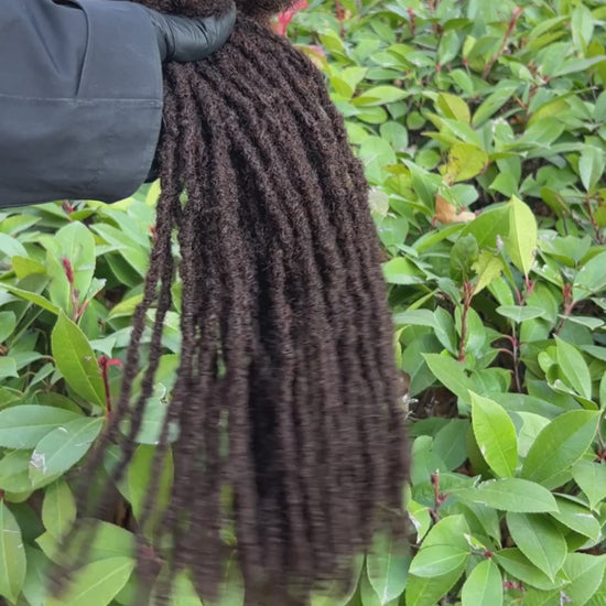 dark brown anwi textured loc extensions with curly tips