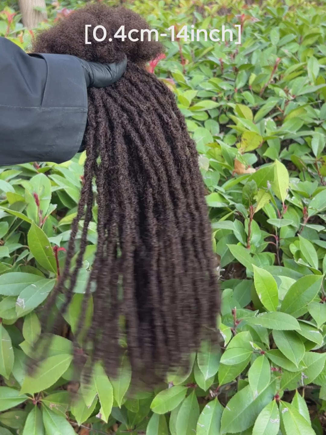 dark brown anwi textured loc extensions with curly tips